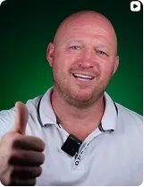 A patient giving a thumbs up, on green